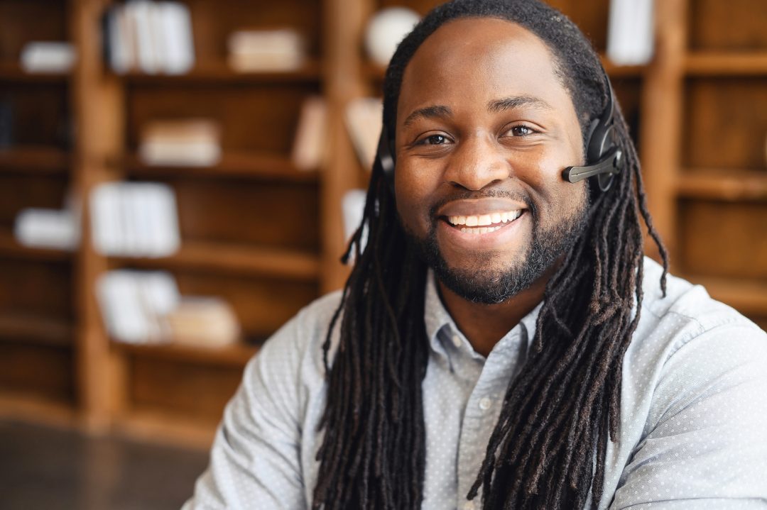 African American coach with headset